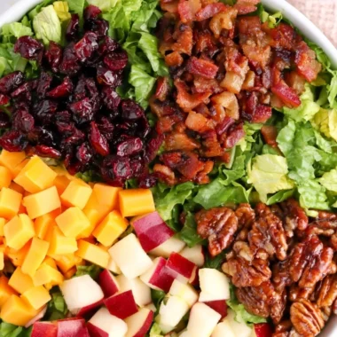 Colorful autumn chopped salad featuring fresh vegetables and seasonal ingredients