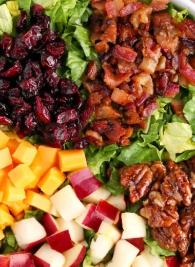 Colorful autumn chopped salad featuring fresh vegetables and seasonal ingredients