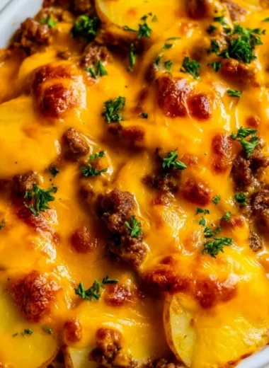 Delicious Hobo Casserole with ground beef, vegetables, and cheese baked to perfection.