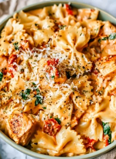 Creamy Marry Me Chicken Pasta topped with herbs and Parmesan cheese.