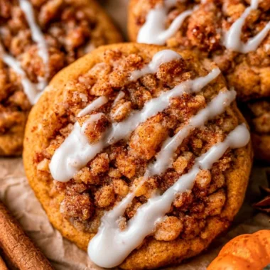 Pumpkin coffee cake cookies freshly baked on a cooling rack