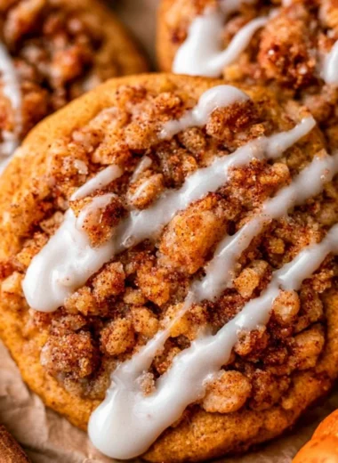 Pumpkin coffee cake cookies freshly baked on a cooling rack